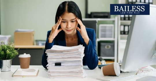 stressed Asian employee